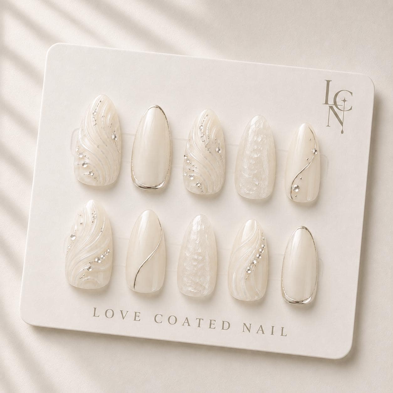 How Many Adhesive Tabs Do You Need for a 10‑Nail Almond Bridal Set and Can You Reuse Them Safely?